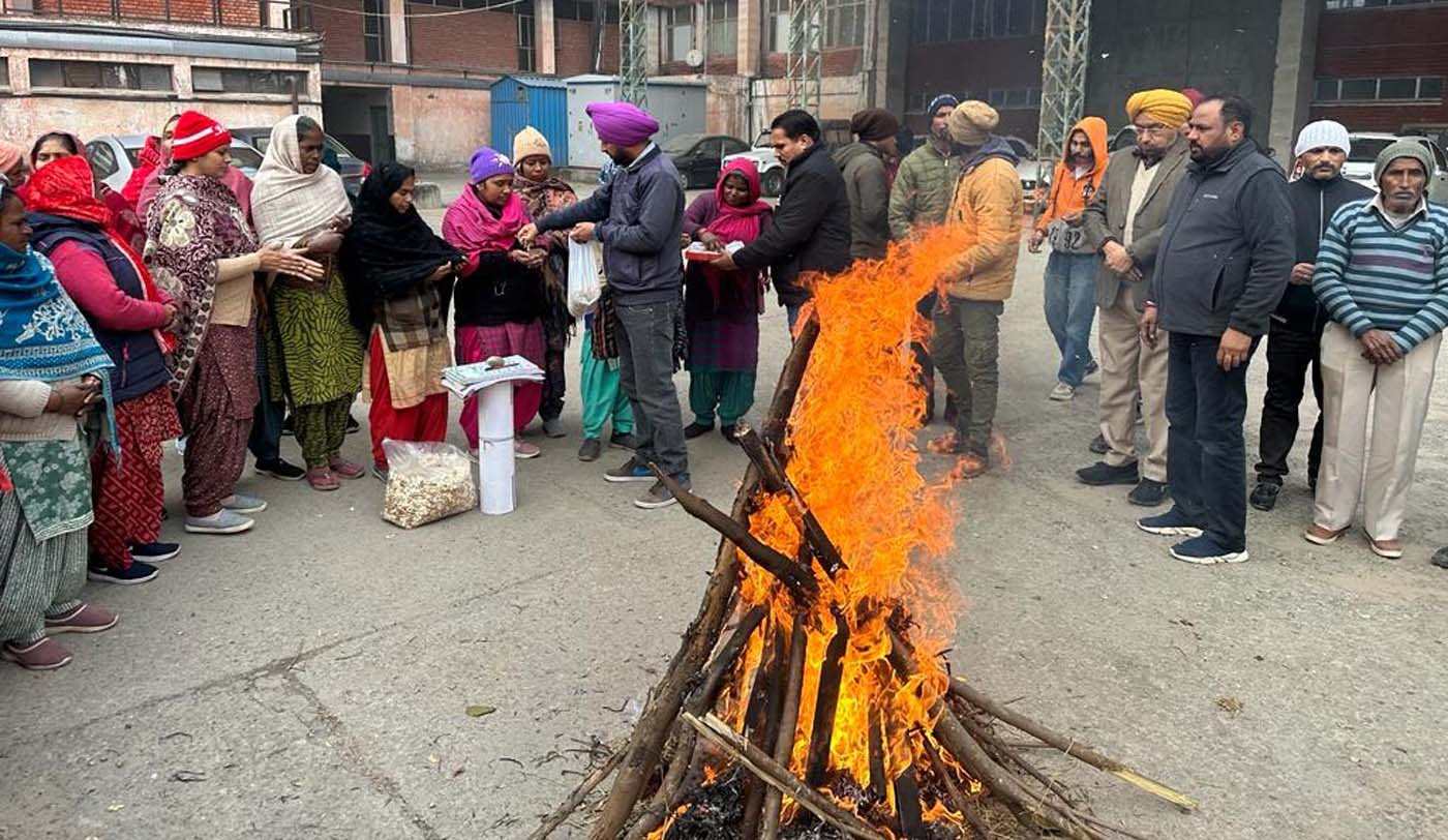 Cleaning workers working in the Punjab School Education Board celebrated Lohri